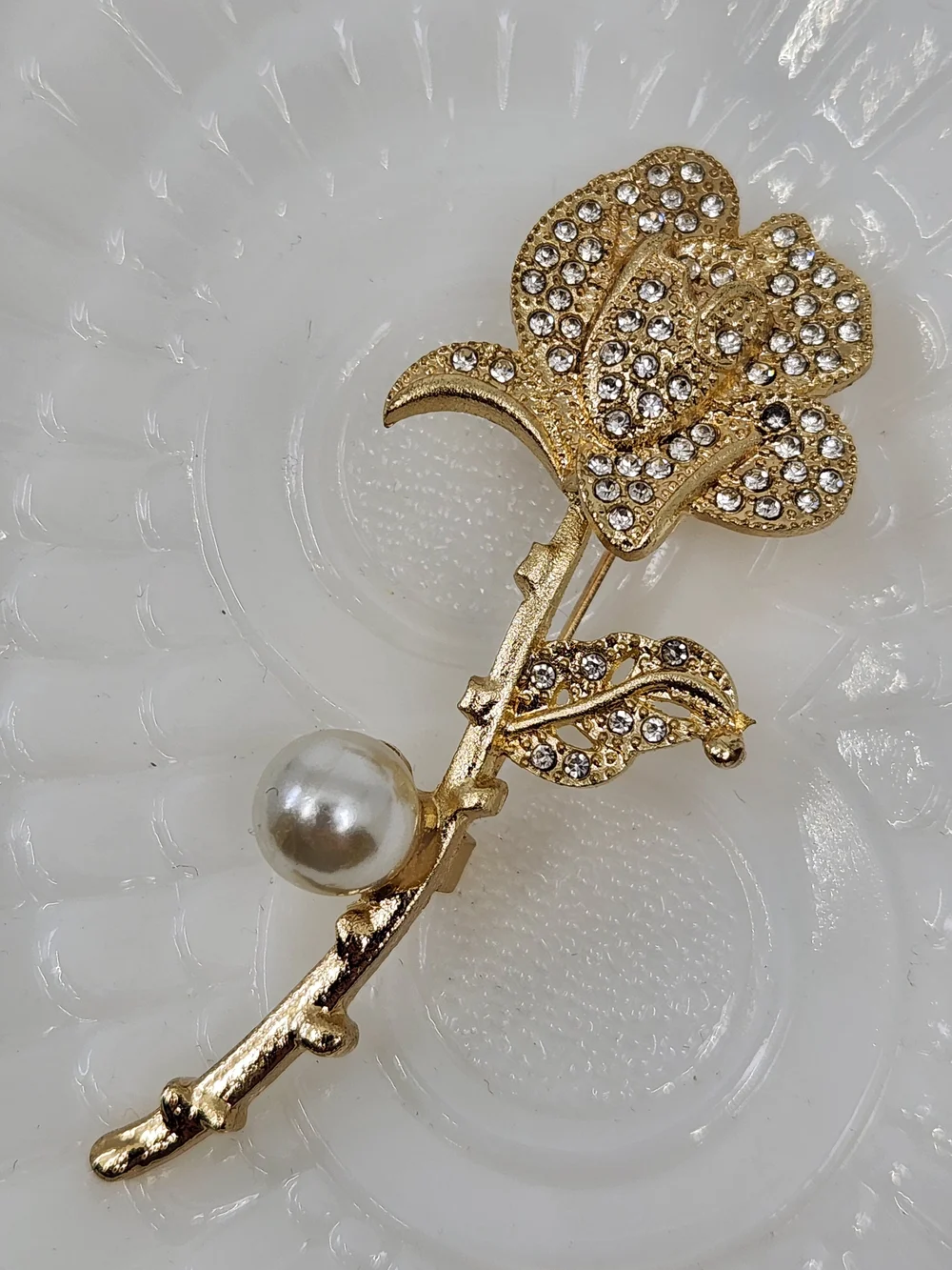 Gold Tone Crystal Rose Brooch with Faux Pearl Accent